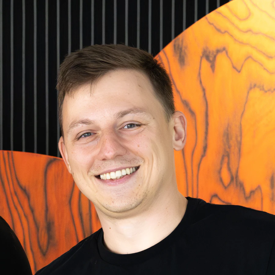 Nick Lahoika wearing a black company T-shirt